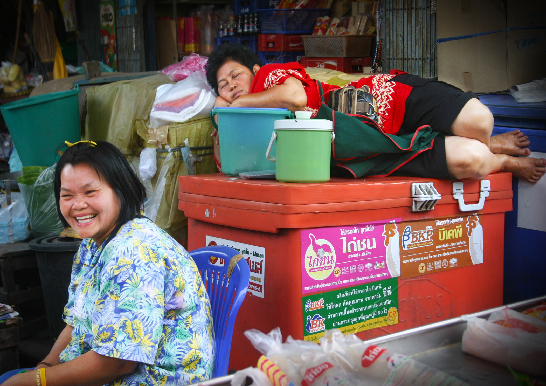 Quick naps at the market in South-East Asia